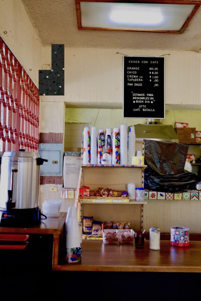 inside of coffee shop with coffee urn